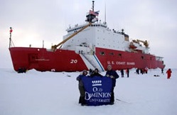 Graduate students Paula Zimmerman and John Rand at the North Pole with Dr. Darby, Sept. 12, 2005 during the Healy-Oden Trans-Arctic Expedition (HOTRAX).